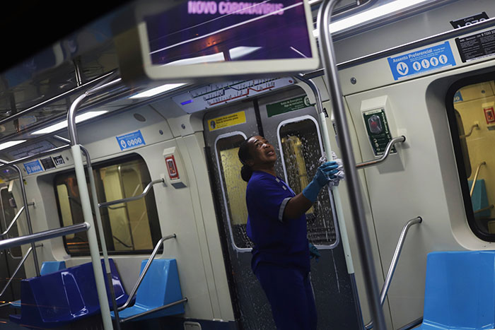A cleaner works on the disinfection of a subway train as a measure against the coronavirus