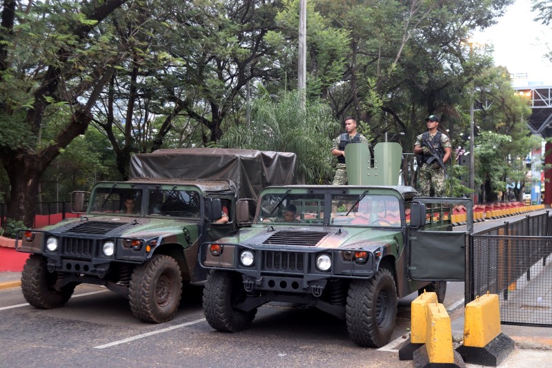 Paraguayan soldiers patrol the Friendship Bridge that connects Ciudad del Este in Paraguay with