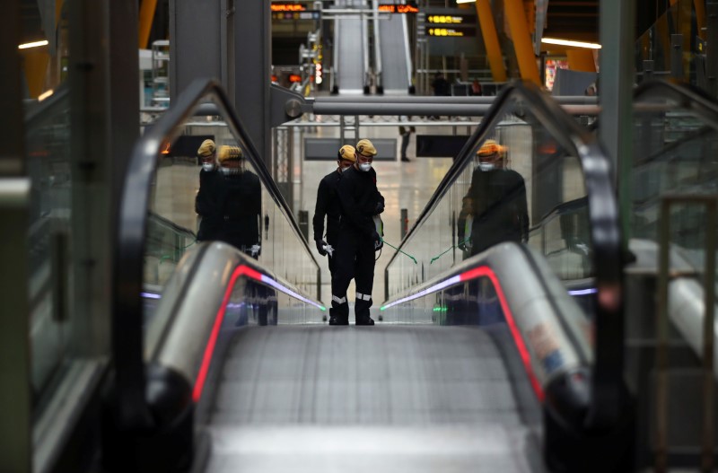 Military Emergency Unit members disinfect Madrid?s Adolfo Suarez Barajas Airport in Madrid