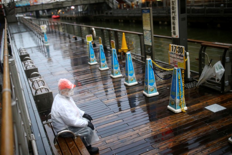 A ship is pictured on an almost empty pier in the Dotonbori entertainment district of Osaka