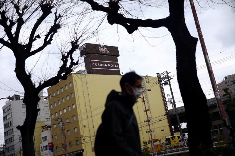 A man, wearing protective mask following an outbreak of the coronavirus disease (COVID-19),