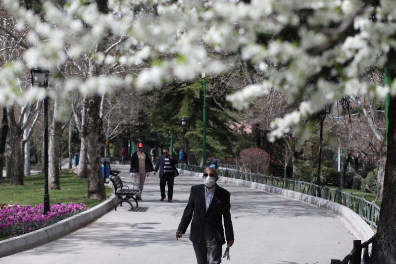 FILE PHOTO: A man wears a protective face mask, amid fear of coronavirus disease (COVID-19), as