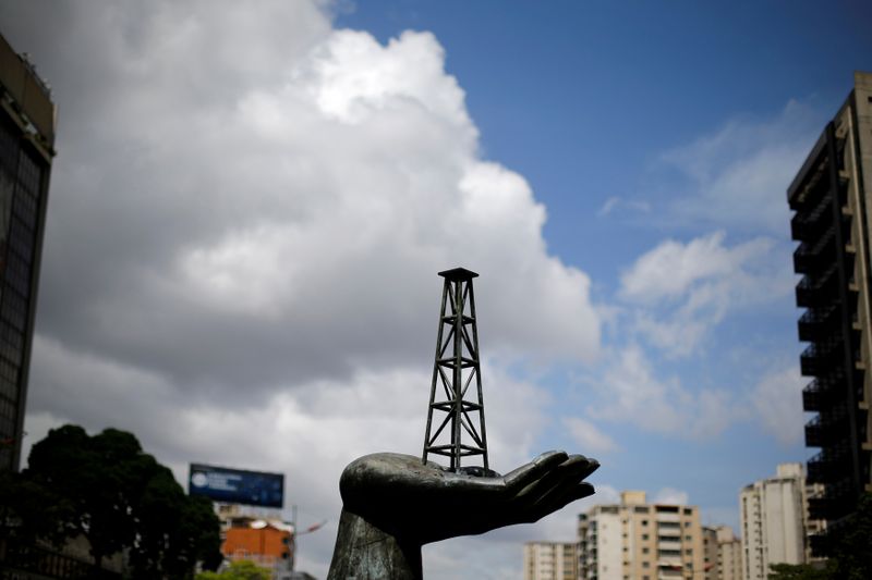 FILE PHOTO: A sculpture is seen outside a building of Venezuela's state oil company PDVSA in