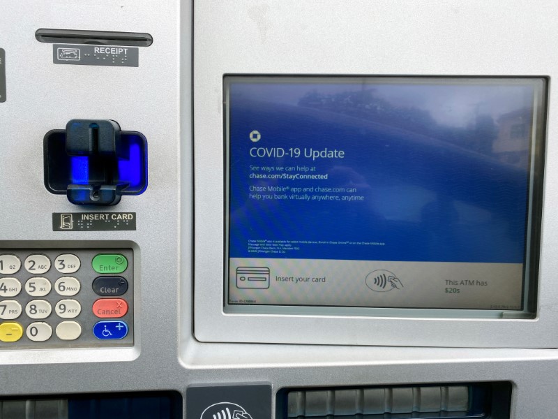 FILE PHOTO: A Chase bank drive-through ATM screen is seen with a COVID-19 message in Los
