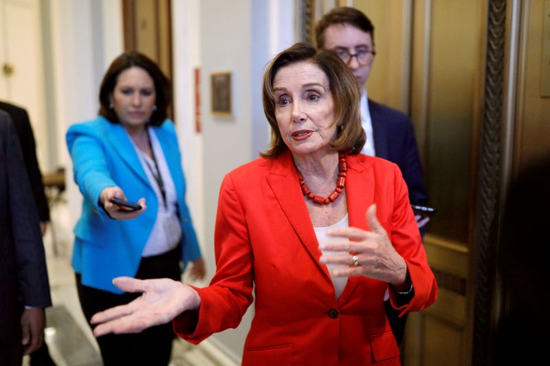 Speaker of the House Pelosi speaks to news reporters ahead of a vote on the coronavirus relief