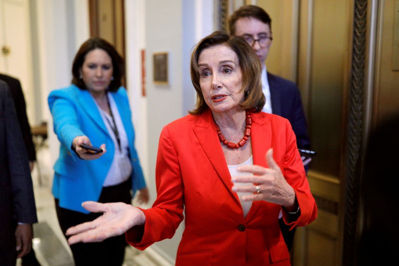 Speaker of the House Pelosi speaks to news reporters ahead of a vote on the coronavirus relief