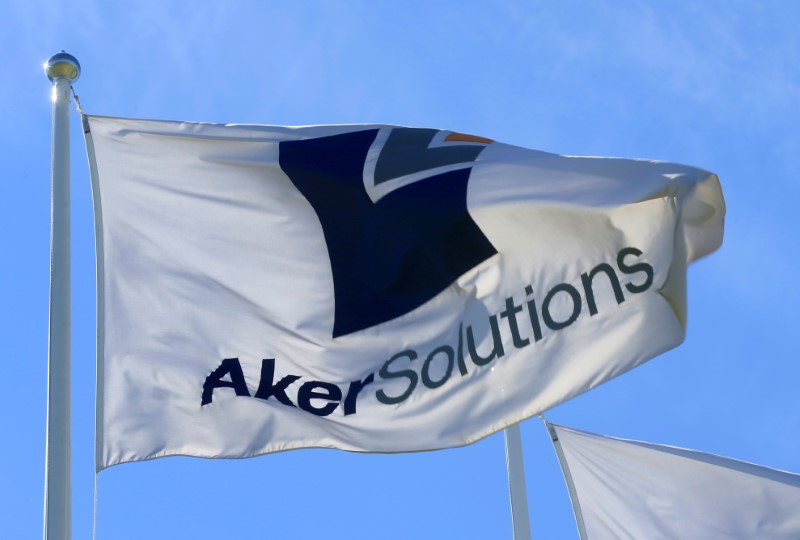 FILE PHOTO: Aker Solutions flag flutters next to their headquarters in Fornebu