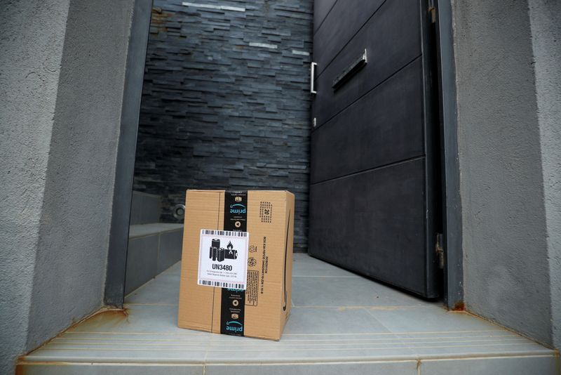 FILE PHOTO: An Amazon package is delivered and left at the door during the coronavirus disease