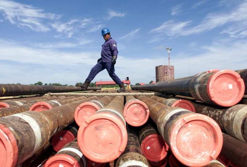 FILE PHOTO: An oil worker with Mexico's state owned oil company, PEMEX (Petroleos de Mexico),