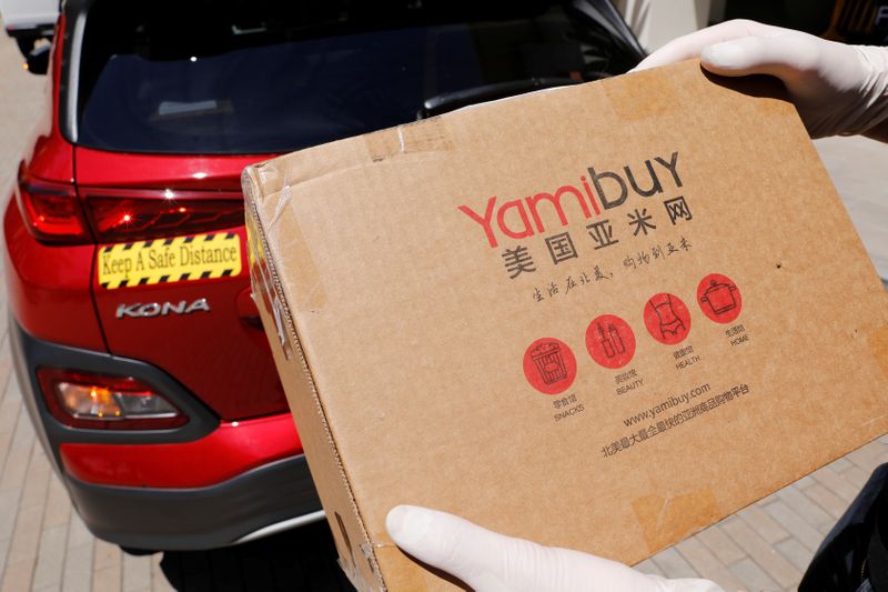 Autonomous electric vehicles deliver packages during the outbreak of the coronavirus disease