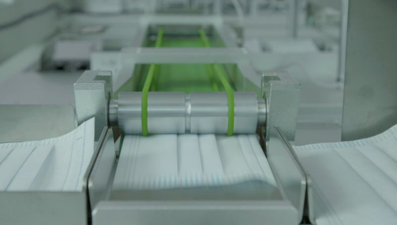 Still image from video of Razer's face mask production line in Singapore