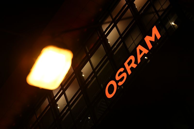 The logo of German lighting manufacturer Osram is illuminated