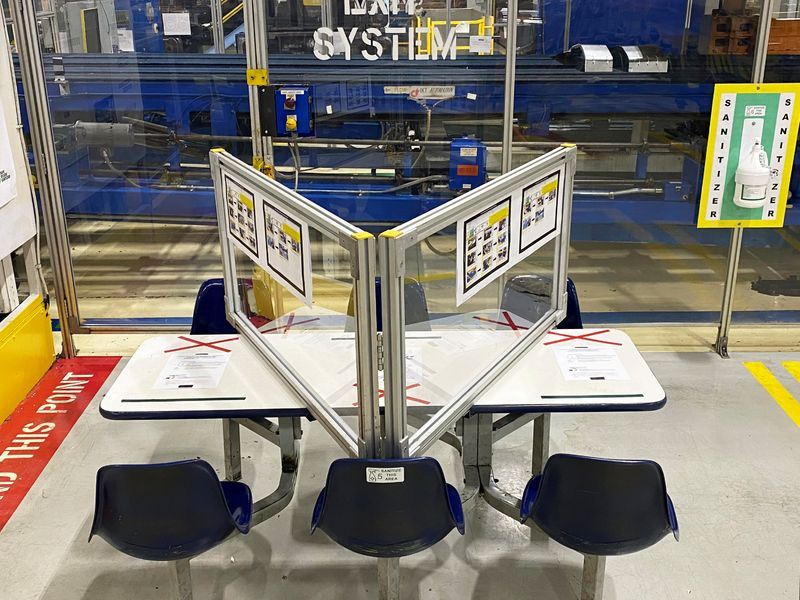 The floor of the final line at FCA's Brampton Assembly Plant is marked with stickers to help