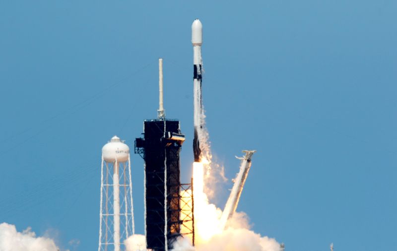 FILE PHOTO: A SpaceX Falcon 9 rocket lifts off from pad 39A with the seventh batch of SpaceX