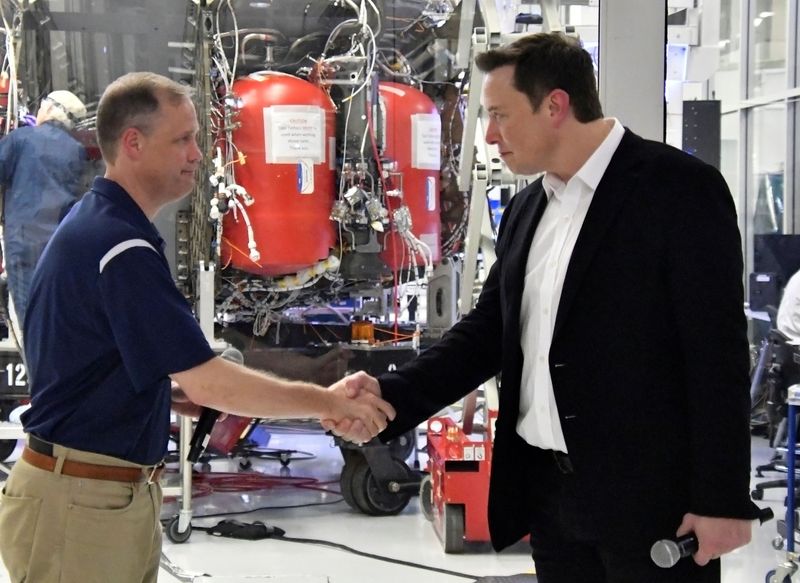 FILE PHOTO: NASA Administrator Jim Bridenstine and SpaceX Chief Engineer Elon Musk shake hands