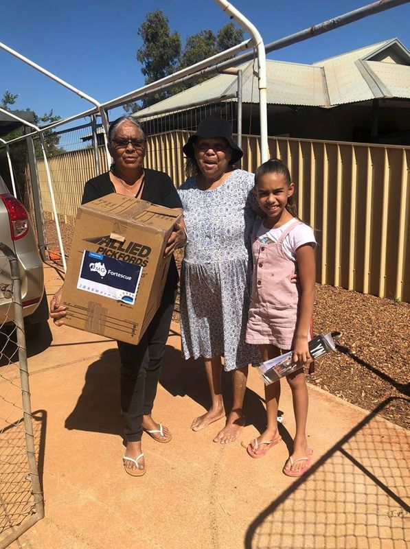 A coronavirus care package organised by Fortescue Metals Group and its partners is delivered to