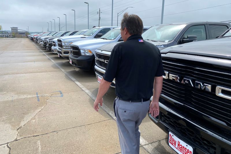 Noah Wolter, general manager of Charles Gabus Ford, shows off an F-Series truck in Des Moines