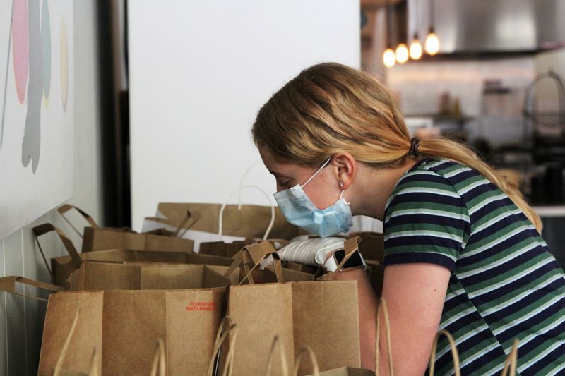 FILE PHOTO: Alcira Perez, a dish washer of nine years at Farley’s East cafe that closed due