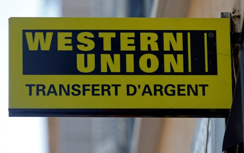 FILE PHOTO: The logo of a Western Union money transfer point is seen in Marseille