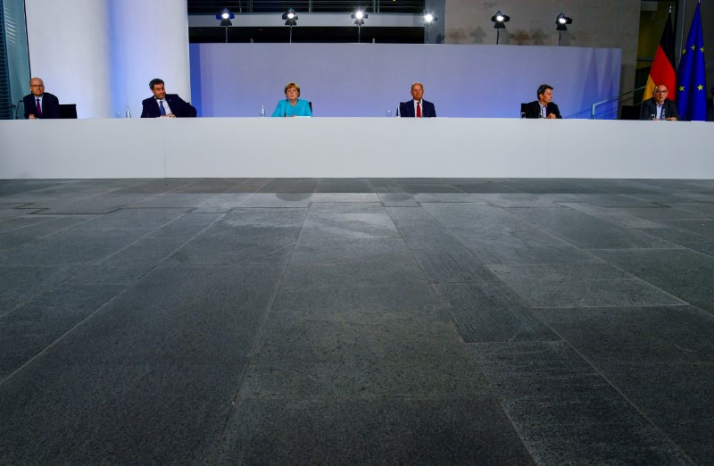 German Economy Minister, Peter Altmaier, addresses the media during a news conference in Berlin