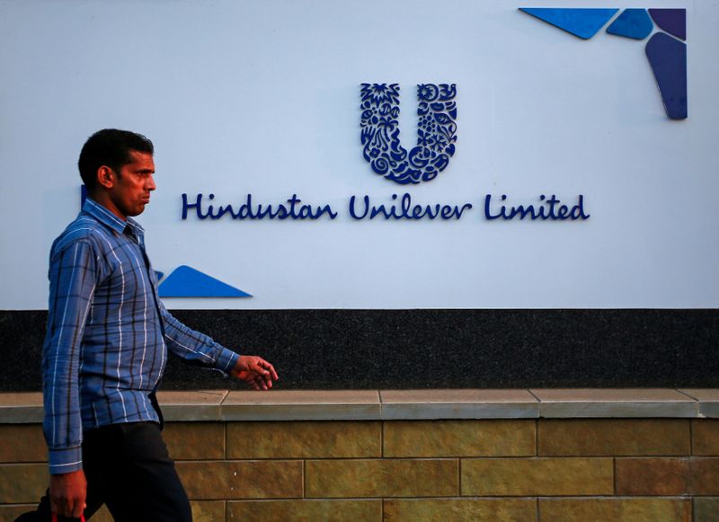FILE PHOTO: File picture of a pedestrian walking past the Hindustan Unilever Limited
