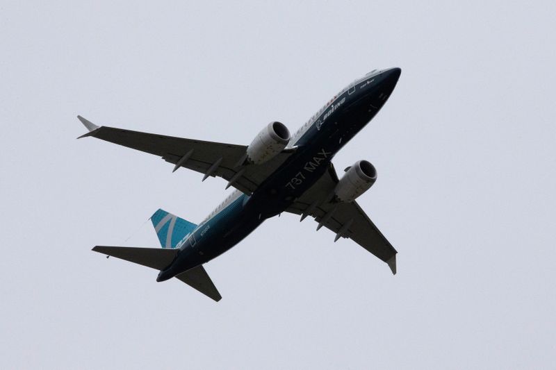A Boeing 737 MAX airplane takes off on a test flight from Boeing Field in Seattle