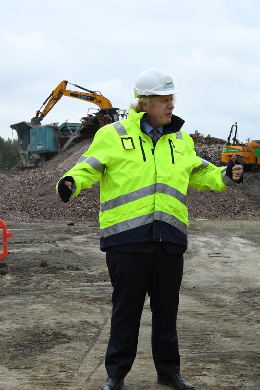 Britain's Prime Minister Boris Johnson visits the Speller Metcalfe's building site in Dudley