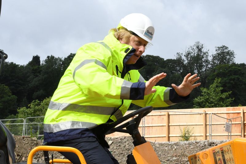 Britain's Prime Minister Boris Johnson visits the Speller Metcalfe's building site in Dudley