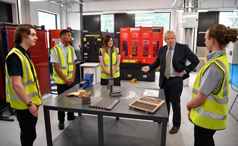 Britain's Prime Minister Boris Johnson delivers a speech during his visit to Dudley College of