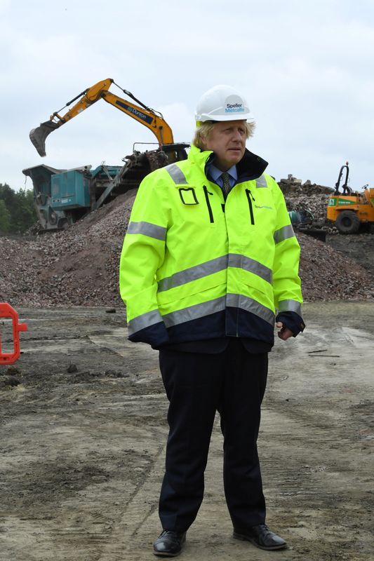 Britain's Prime Minister Boris Johnson visits the Speller Metcalfe's building site in Dudley